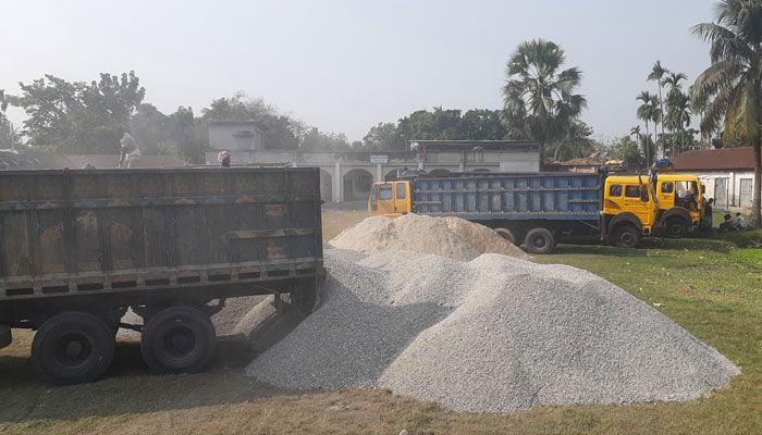 নাটোরে বিদ্যালয় মাঠে নির্মাণসামগ্রী, দুর্ভোগে শিক্ষার্থী