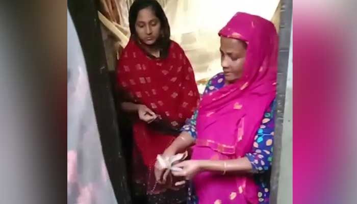 রূপগঞ্জে ভোট কিনতে স্বতন্ত্র প্রার্থীর টাকা বিতরণ, আটক ২