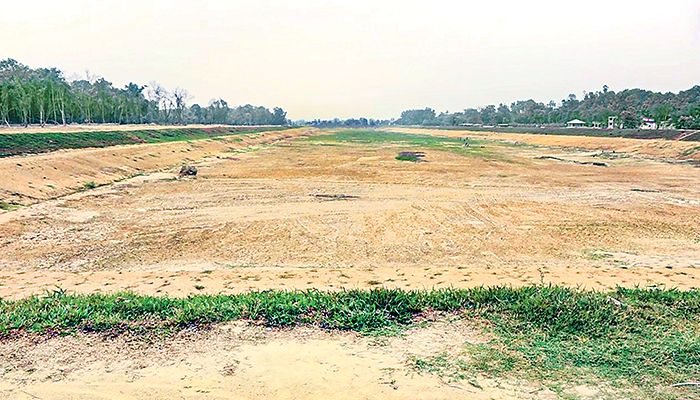 দীঘি শুকিয়ে বন উজাড় করে ‘উন্নয়ন’