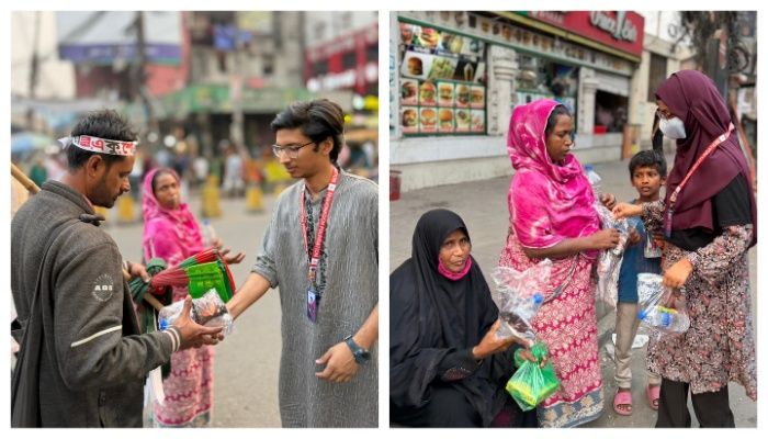 ব্যস্ত রাজপথে ইফতারের স্বস্তি পৌঁছে দিচ্ছে একদল তরুণ